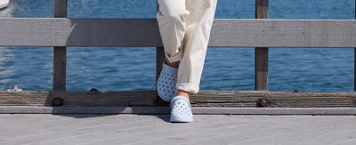 woman standing on dock with joybees clogs on